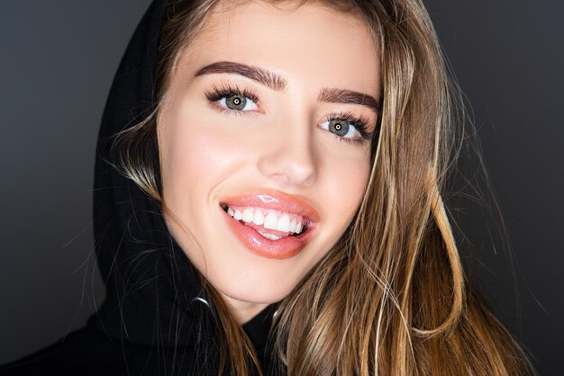 Happy woman face Beauty fashion portrait Smiling young woman