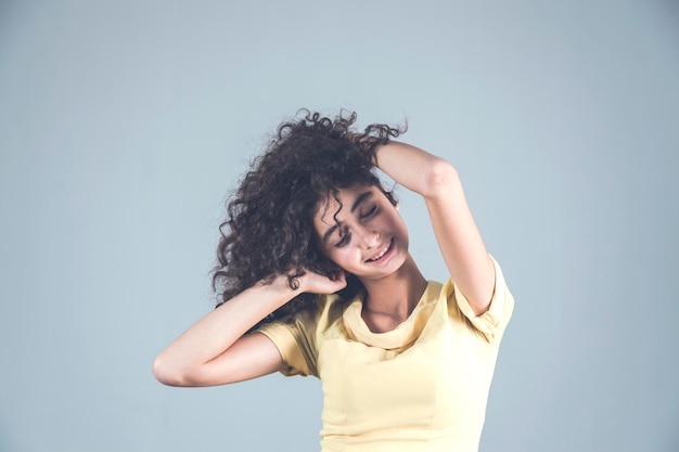 Happy woman hand in panic hair