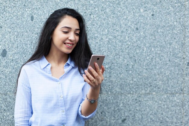 Happy woman hand phone