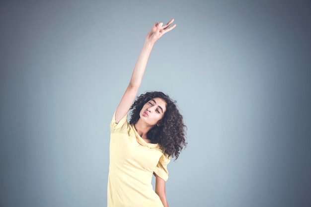 Happy woman hand victory sign