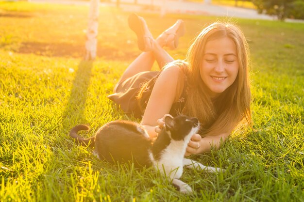 Happy woman lying on field