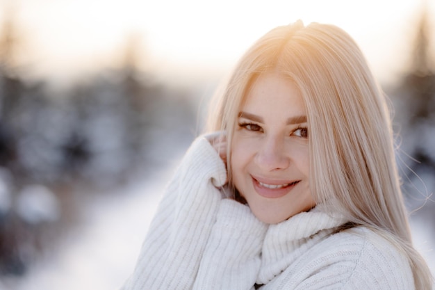 happy woman in the park in winter