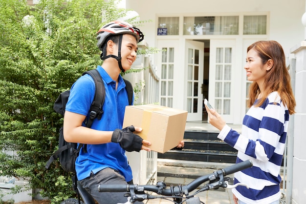 Happy woman receiving package