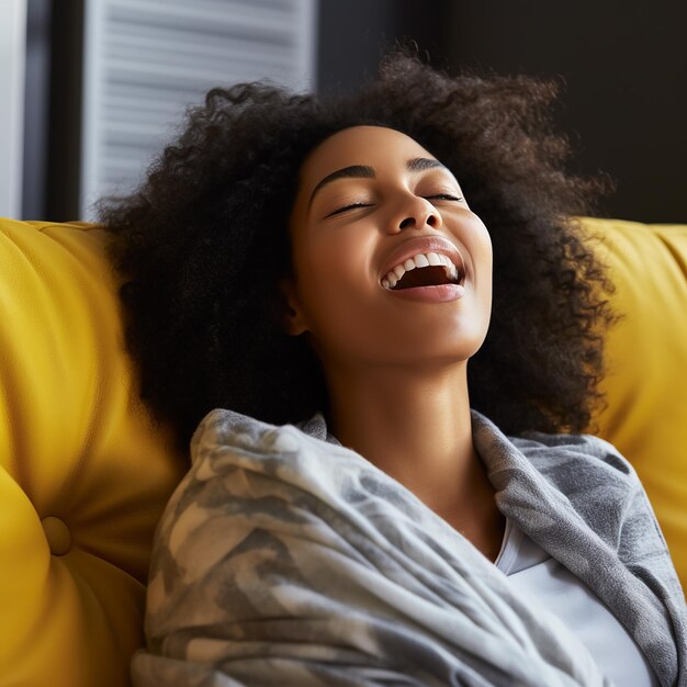 Happy woman relaxing on the sofa