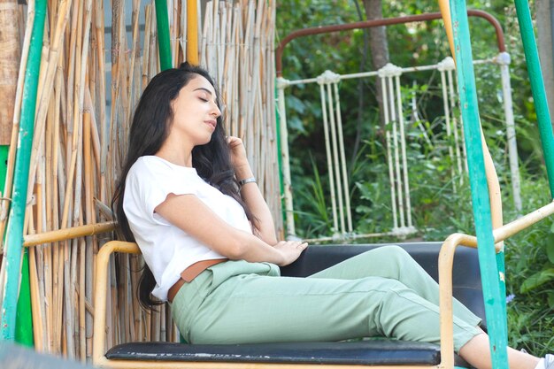 Happy woman on a rocking chair