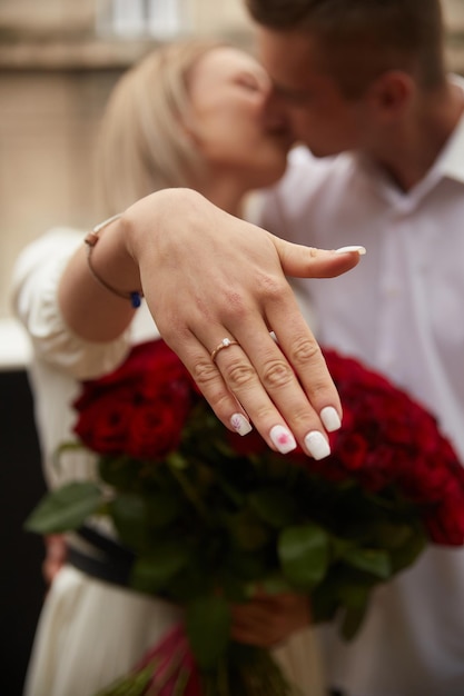 Happy Woman Shows Engagement Ring After Proposal