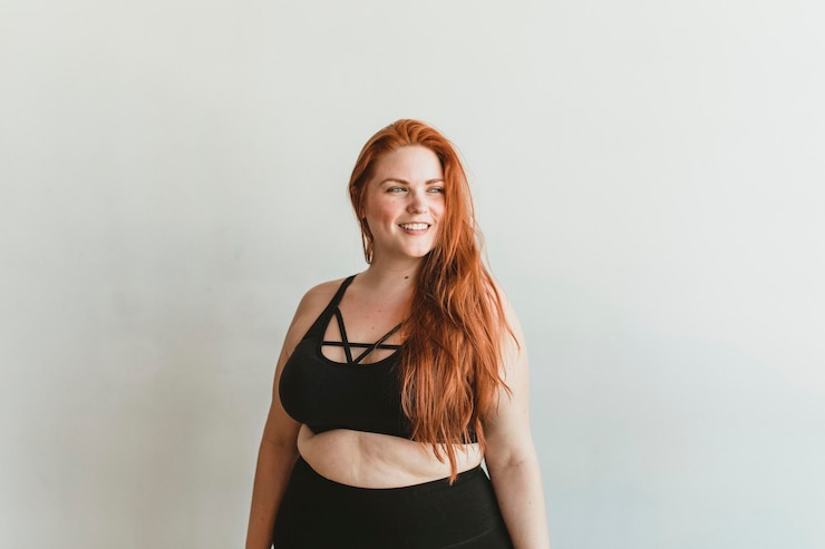 Photo happy woman in a sportswear