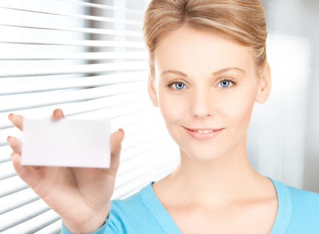 happy woman with blank business or name card