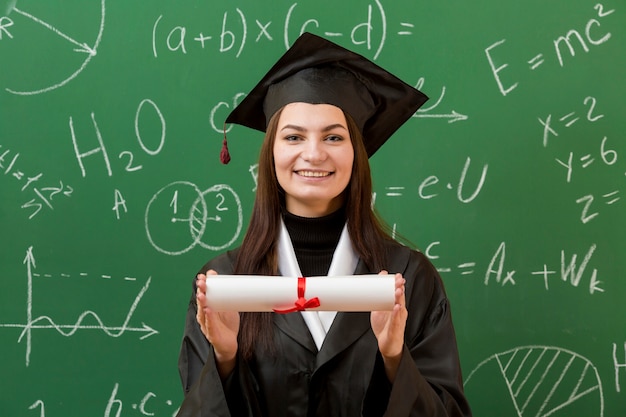 Happy woman with chalkboard