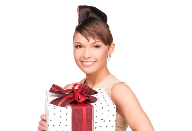 happy woman with gift box over white wall