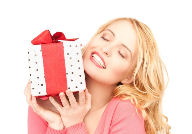 happy woman with gift box over white