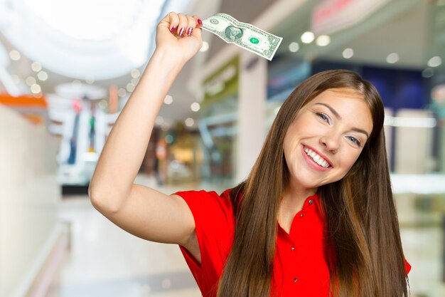 Happy woman with money