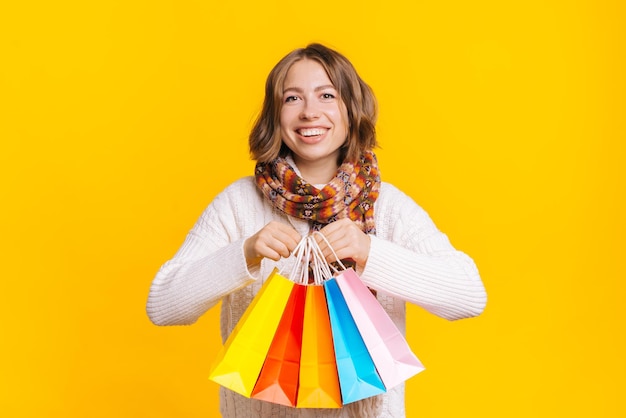 Happy woman with shopping bags