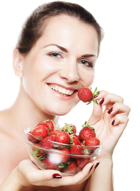 Happy woman with strawberry