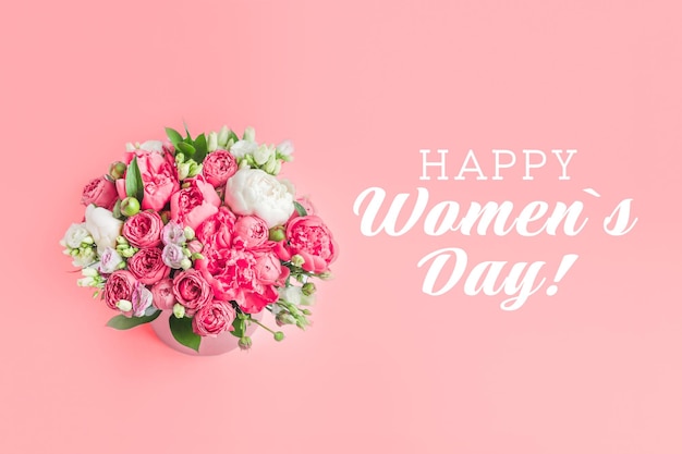 Happy women s day greeting card with text on pink background