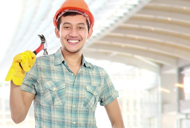 Happy worker with hammer