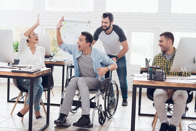 Happy Workers Have Fun on Break in Modern Office.