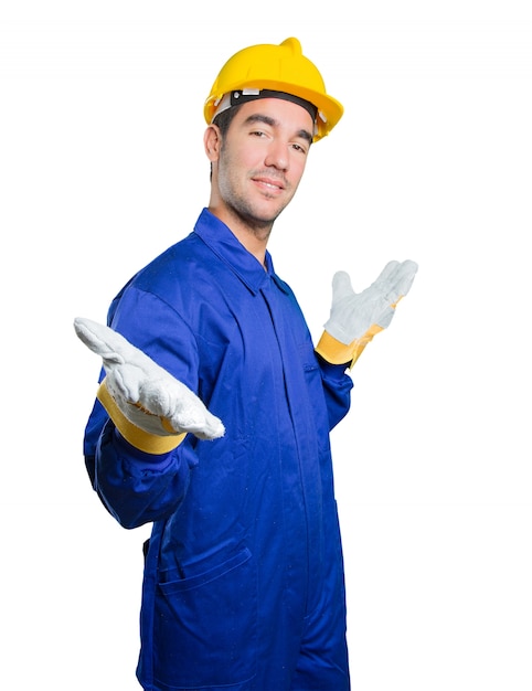 Happy workman welcoming on white background