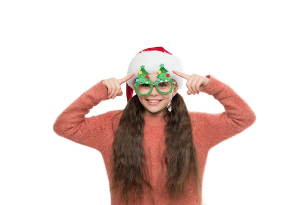 Happy Xmas holiday. Funny kid on Christmas eve. waiting for miracle. small santa white background. merry christmas. winter brings a lot of joy. happy child in party glasses. new year eve.