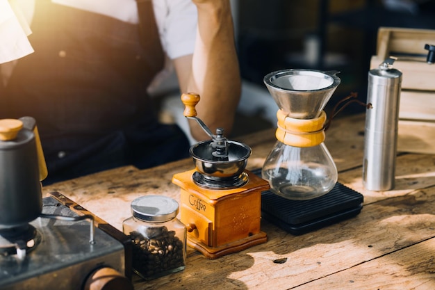 Happy young adult couple making breakfast and drinking coffee together in cozy home kitchen in morning at home Preparing meal and smiling Lifestyle leisure and Love concept