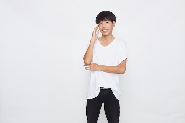 Happy Young Asian men wearing a T-shirt are using positive thinking on white surface.