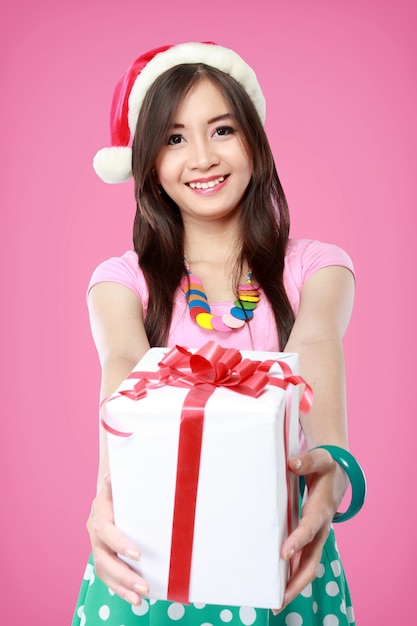 Happy young asian woman bring gift boxes