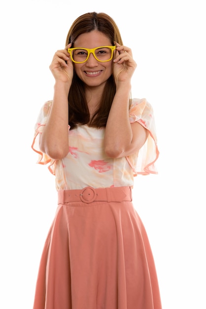 happy young beautiful woman smiling while holding eyeglasses