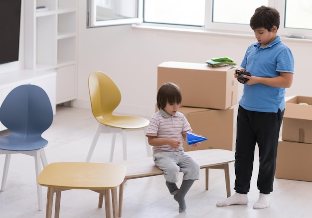 happy young boys enjoying their new modern home