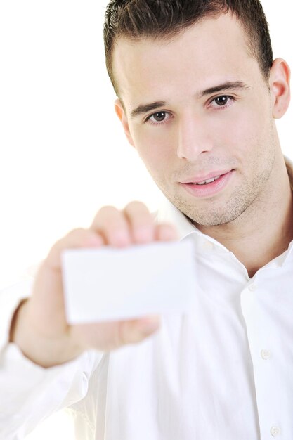 Foto giovane uomo d'affari felice con carta vuota isolato su bianco