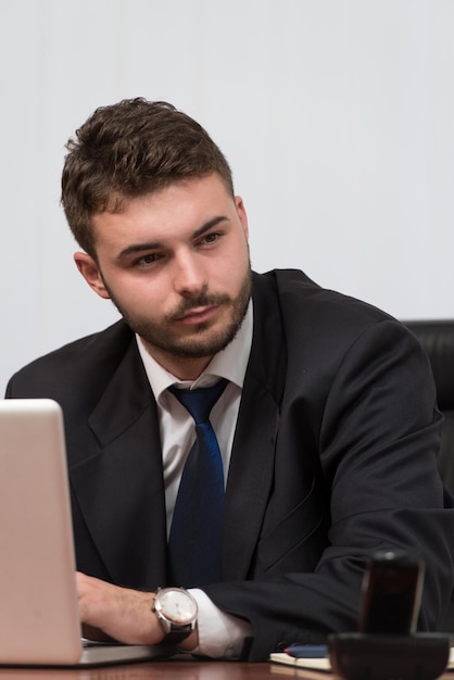 Happy Young Business Man Work In Modern Office On Computer