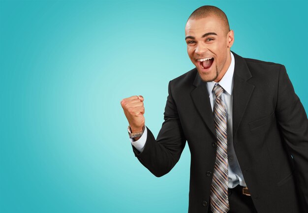 happy young businessman celebrating