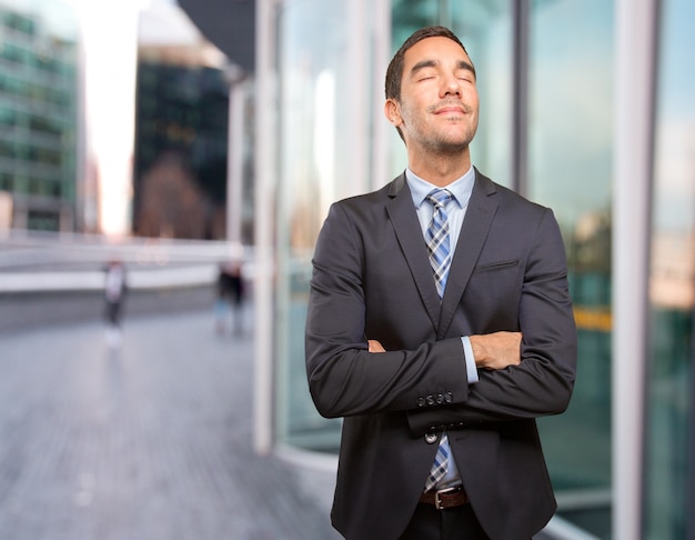 Happy young businessman relaxing