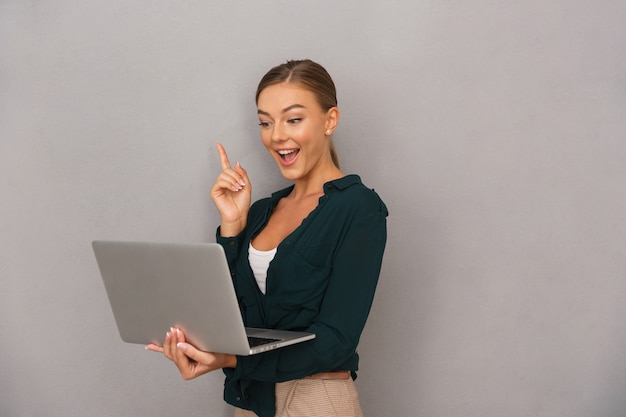 Happy young businesswoman