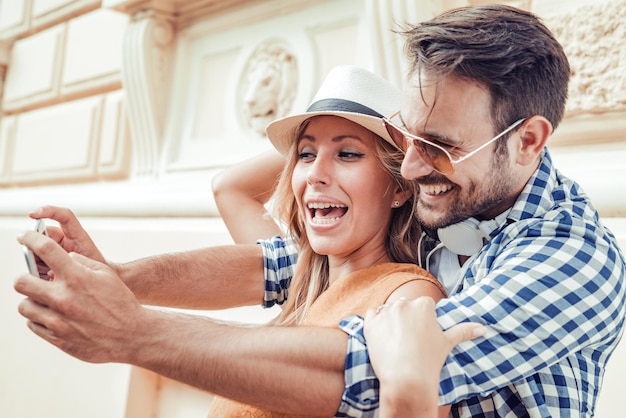 Happy young couple in the city