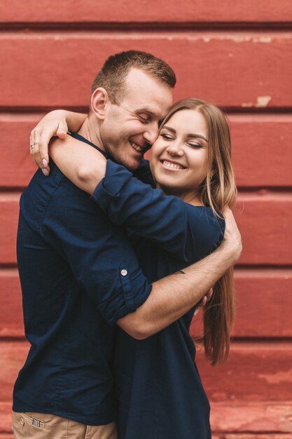 Happy young couple. The concept of a happy family with strong feelings. Young people in love