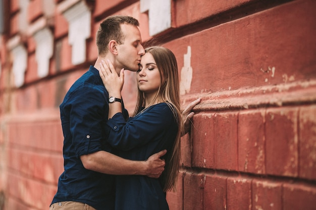 Happy young couple. The concept of a happy family with strong feelings. Young people in love