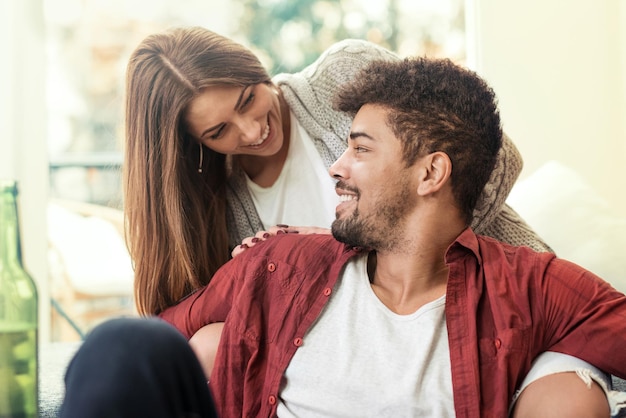 Happy young couple at home