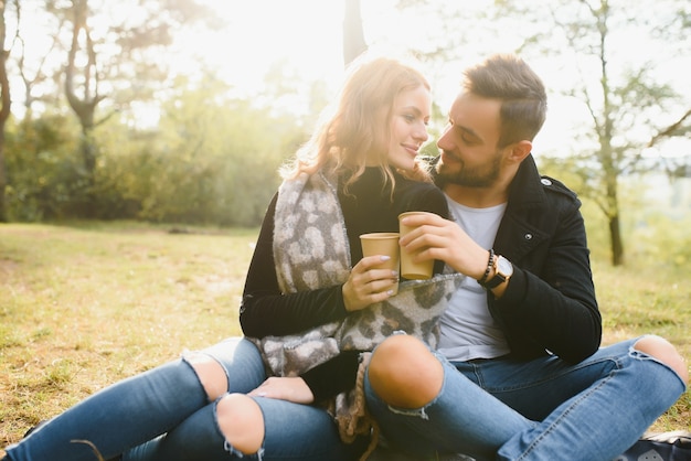 Happy young couple in love at the park