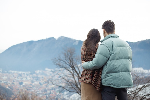 Happy young couple on mountains