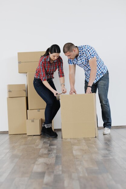 happy Young couple moving in new house