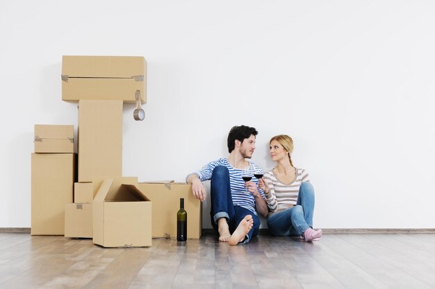 happy Young couple moving in new house