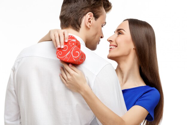 Happy young couple with Valentine's Day present