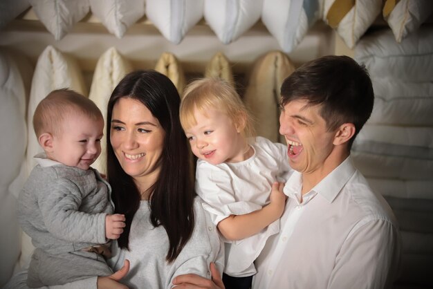 happy young family on shopping portrait of whole family close up