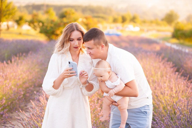 Happy young family summer day outdoor