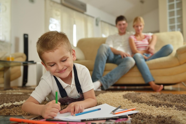 happy young family with kids in bright modern living room have fun and looking big flat lcd tv