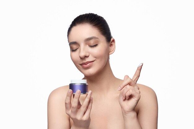 Happy young female against a white background