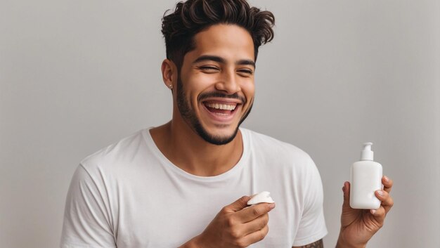 Happy young hispanic man with short hair in white tshort laughing with pride and joy while holding