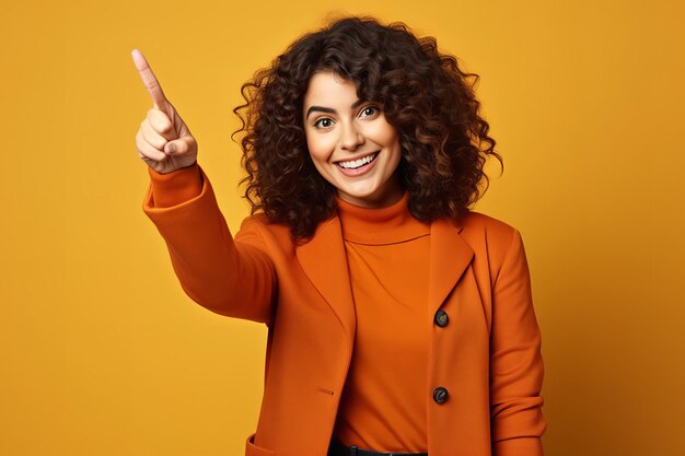 Happy young lady pointing with her finger isolated