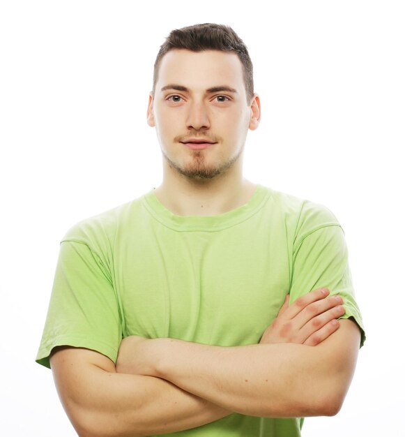 Happy young man in green tshirt