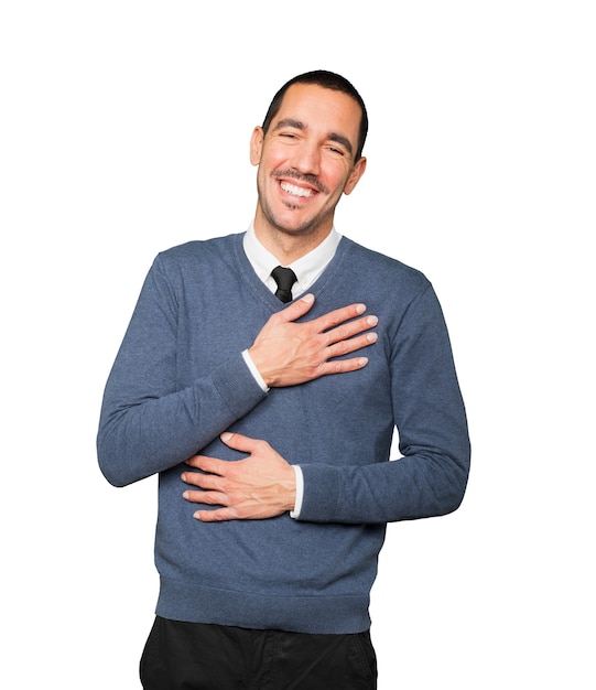 Happy young man laughing